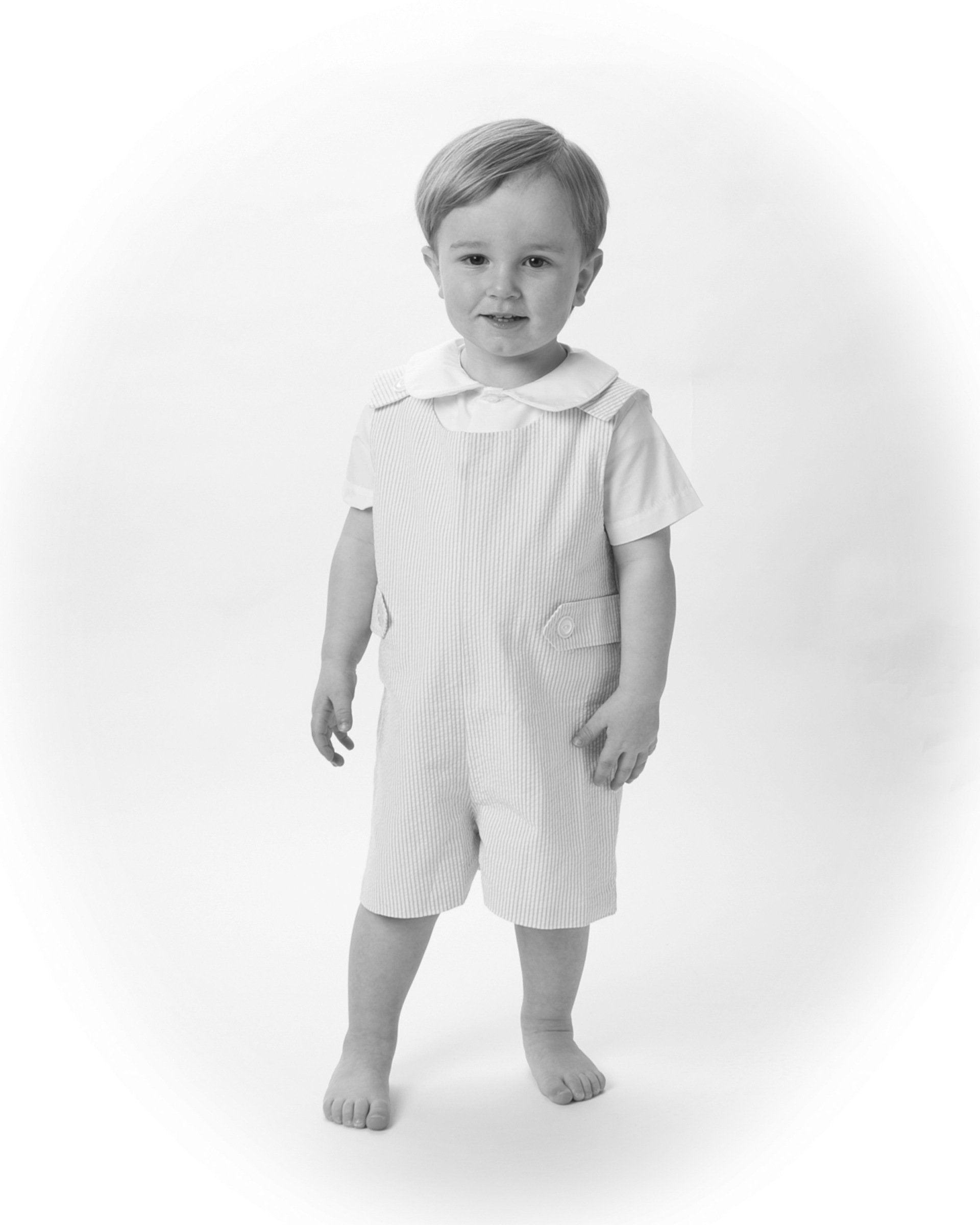 Cute black and white photo of boy standing in Nashville