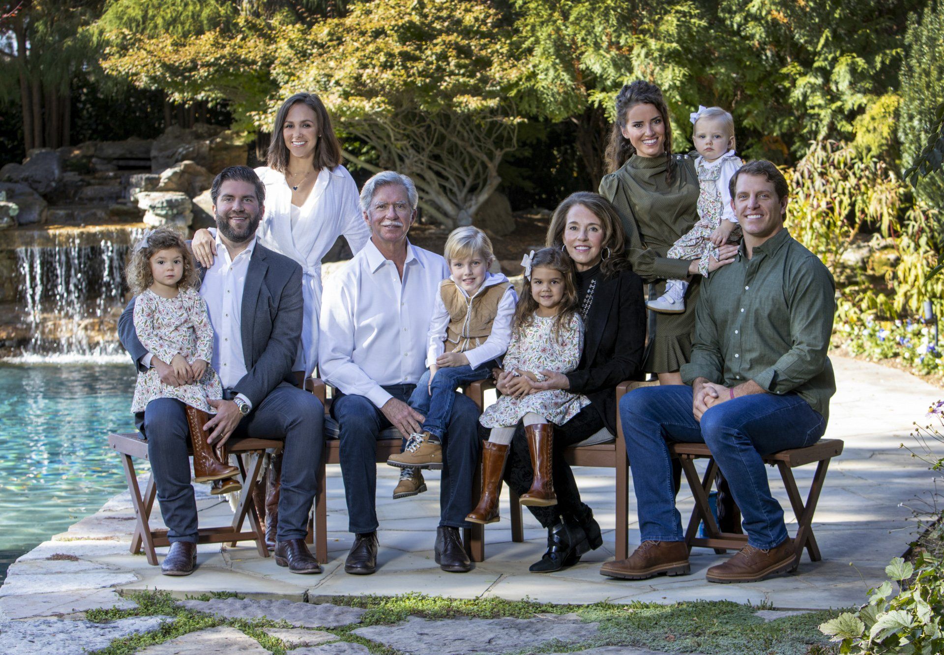 Outdoor family portrait by poolside
