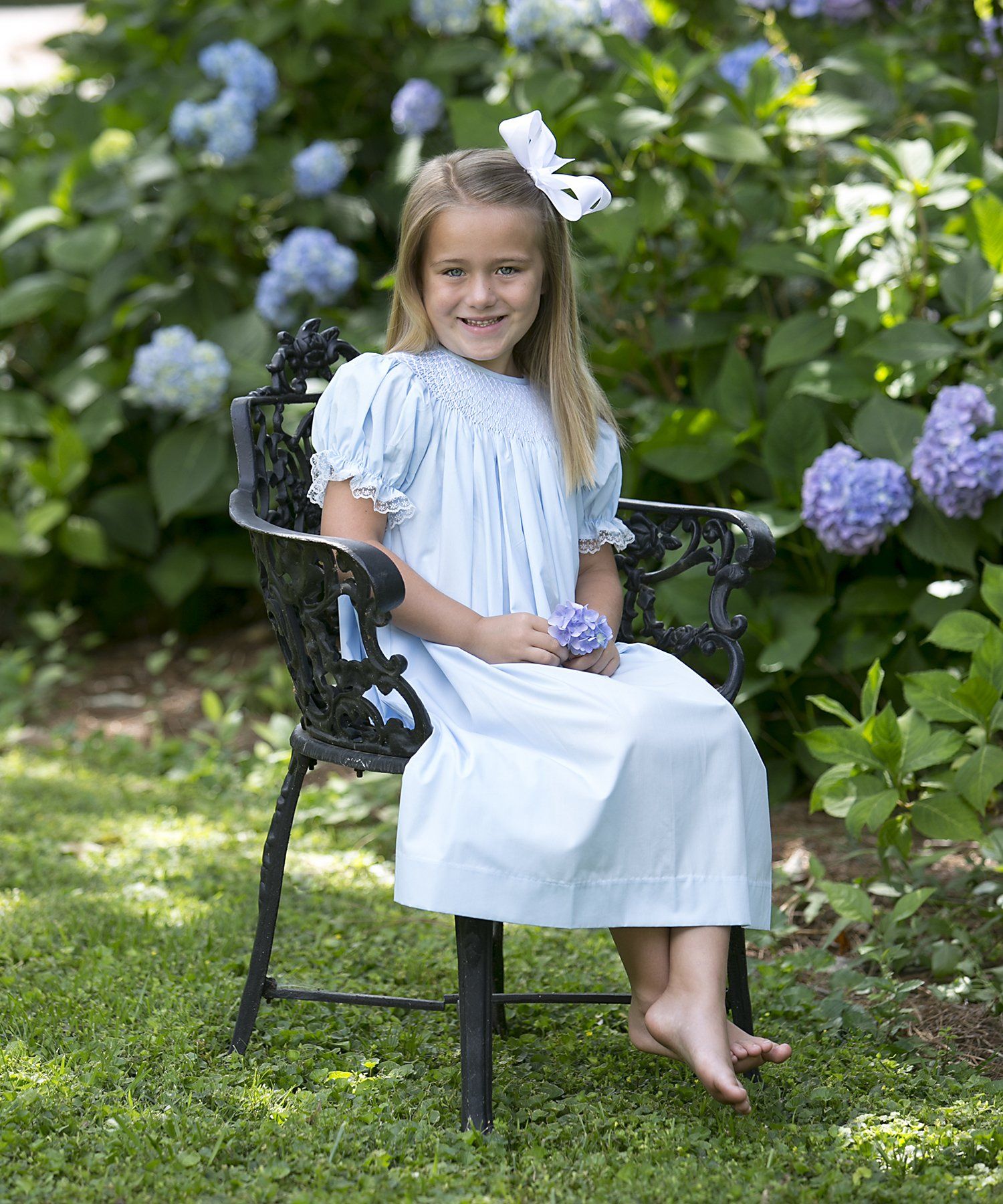 Outdoor portrait of child in chair
