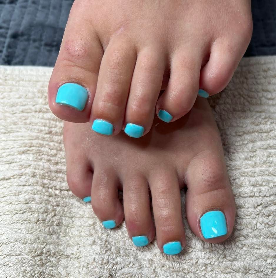 Pedicured Feet With Short, Square, Bright Blue Toenails — Aspire Beauty & Nails in Wagga Wagga, NSW