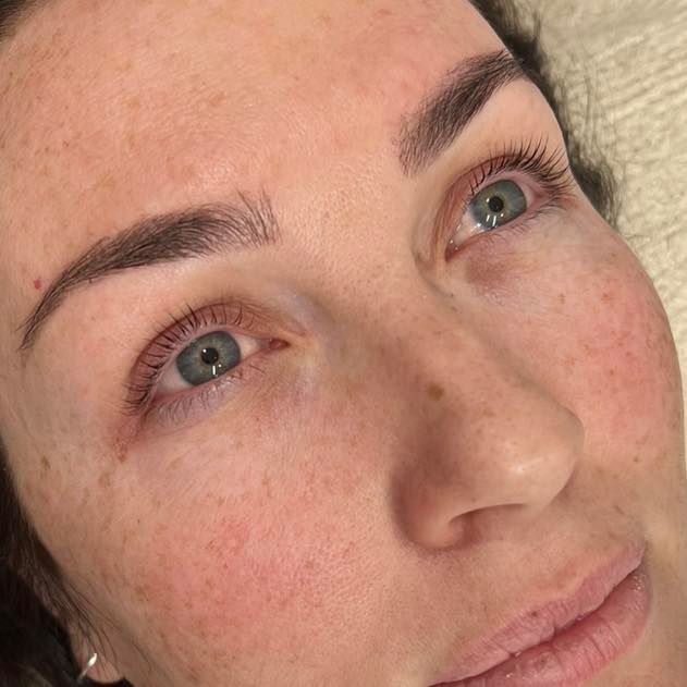 Woman With Freckles and Light Eyes, Recently Done Eyebrows and Lashes — Aspire Beauty & Nails in Wagga Wagga, NSW