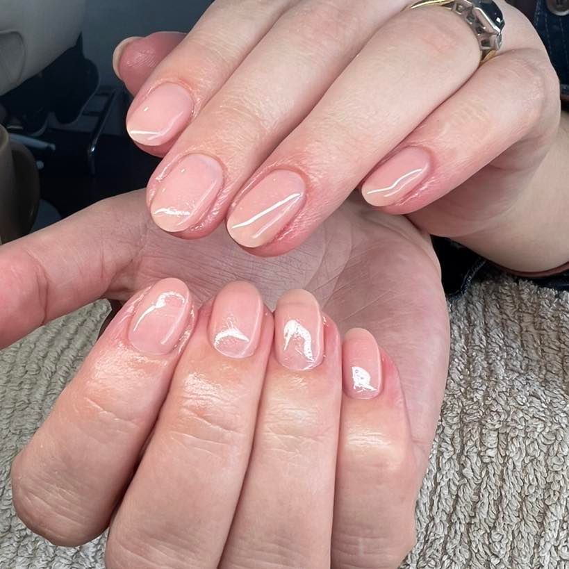 Manicured Oval Nails With a Sheer Pink Polish and a White Outline — Aspire Beauty & Nails in Wagga Wagga, NSW