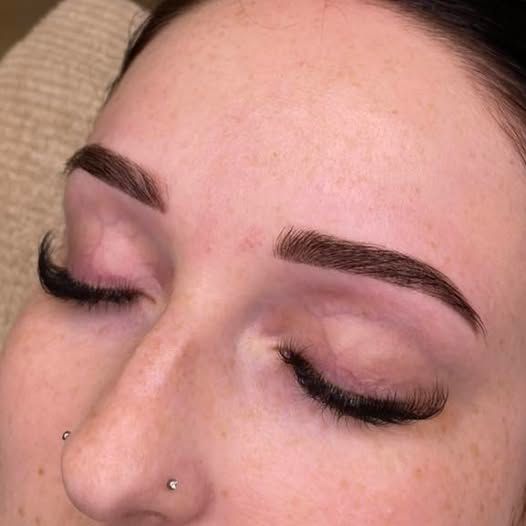 Woman With Closed Eyes, Dark Eyebrows, and Long, Dark Eyelashes — Aspire Beauty & Nails in Wagga Wagga, NSW