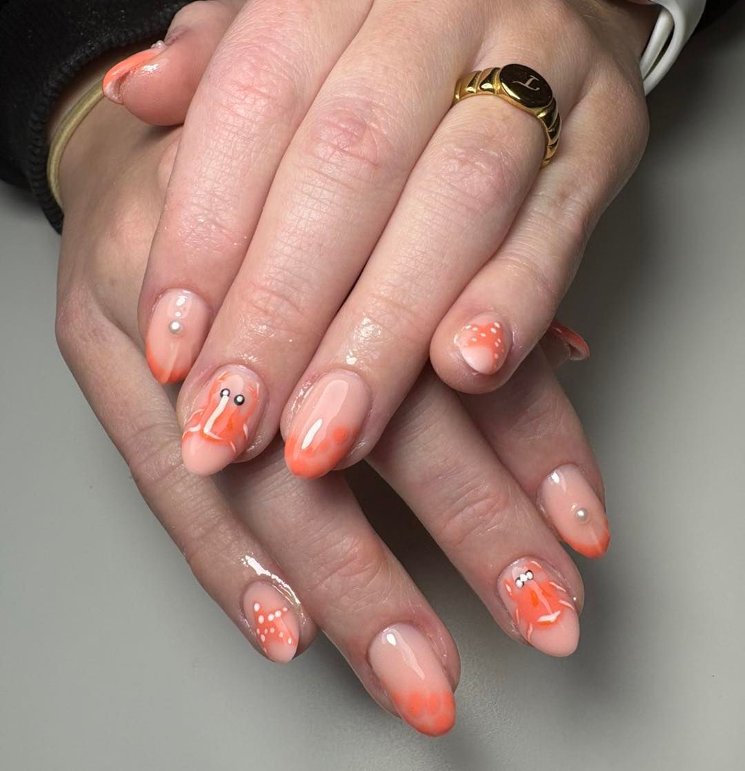 Hands With Oval-shaped Nails, Featuring Orange Ombre Tips — Aspire Beauty & Nails in Wagga Wagga, NSW