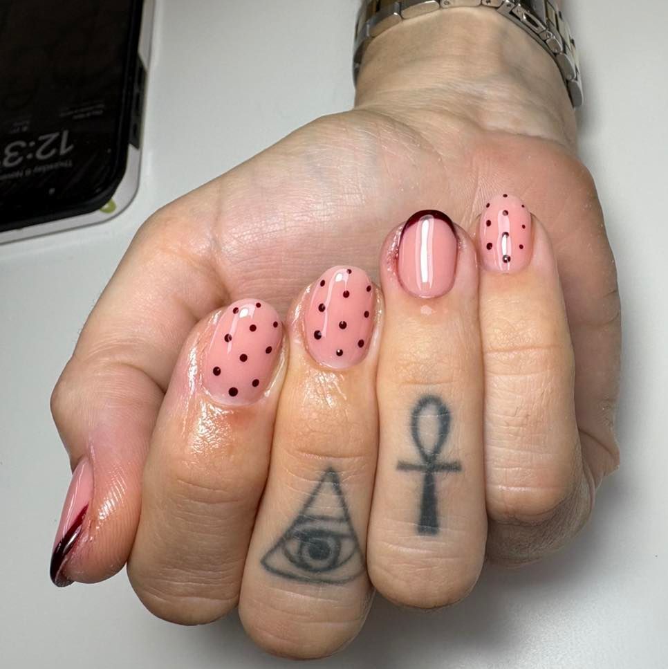 Hand With Pink and Red Nail Art — Aspire Beauty & Nails in Wagga Wagga, NSW