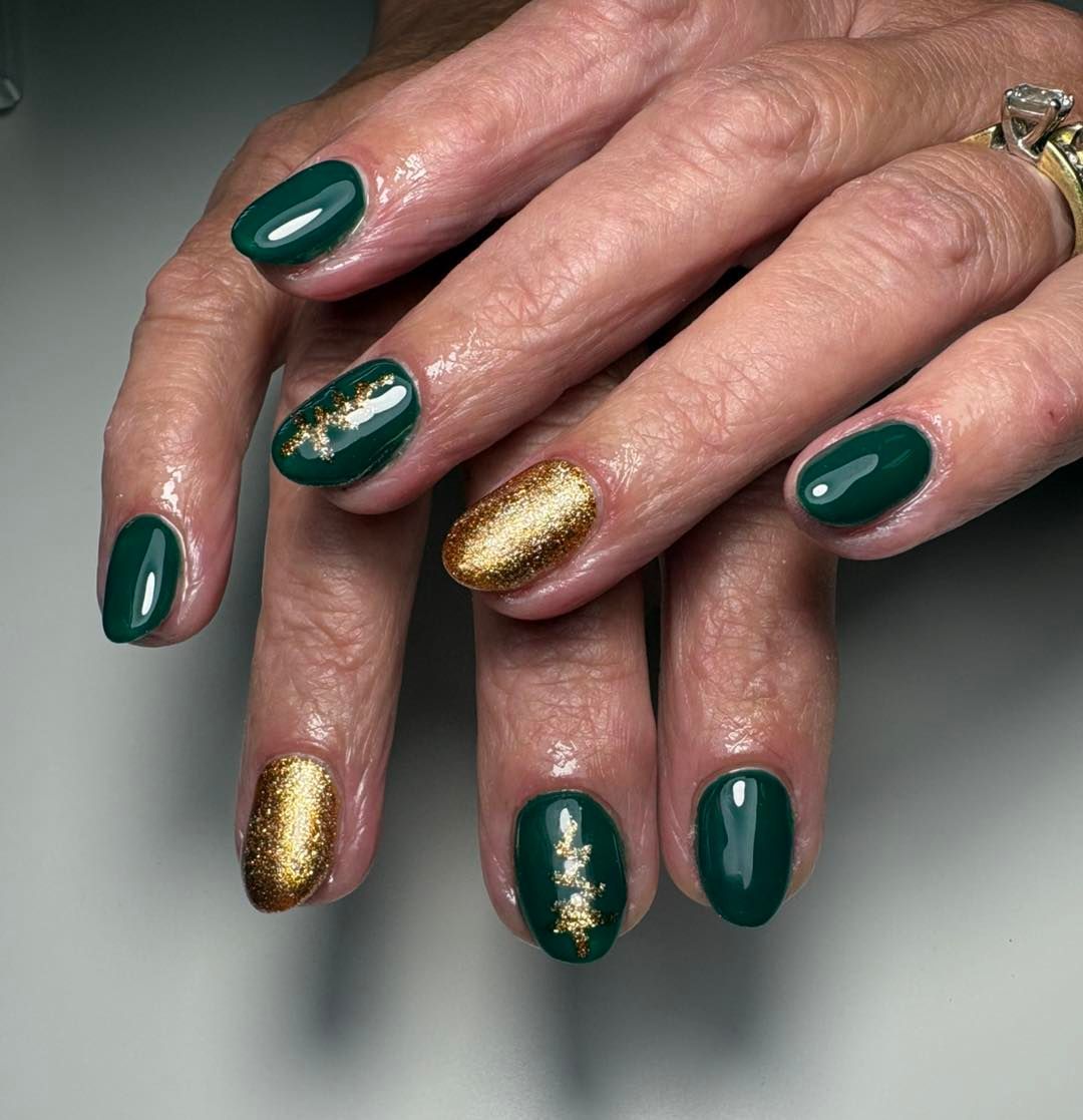 Hands With a Manicure Featuring Dark Green and Gold Glitter Nails — Aspire Beauty & Nails in Wagga Wagga, NSW
