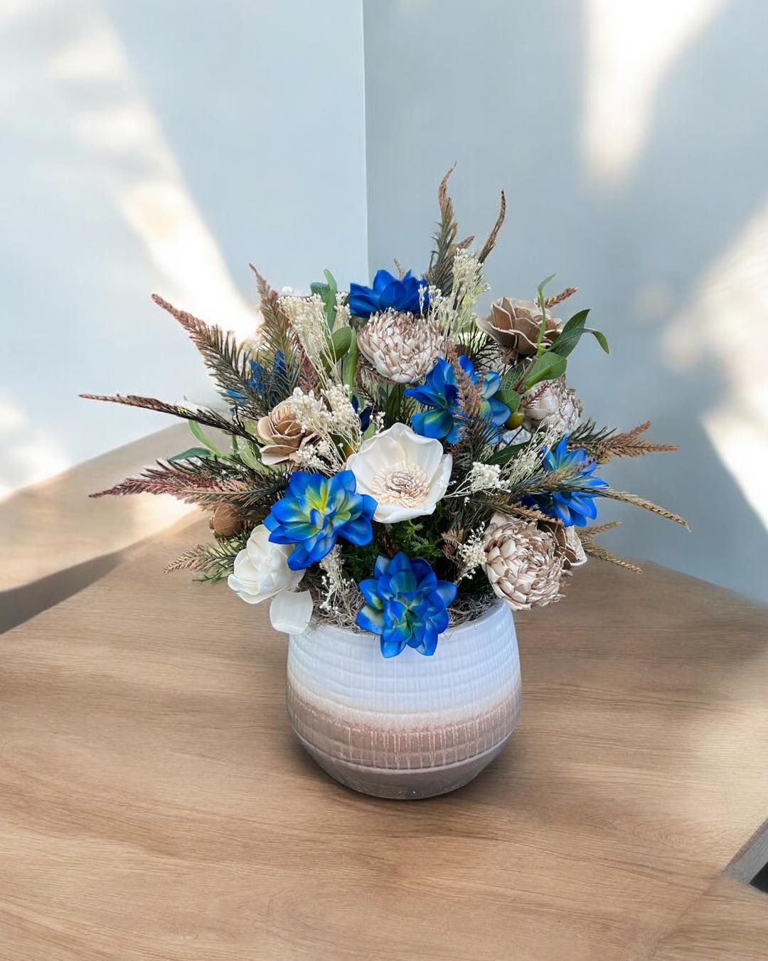 blue and white flower arrangement