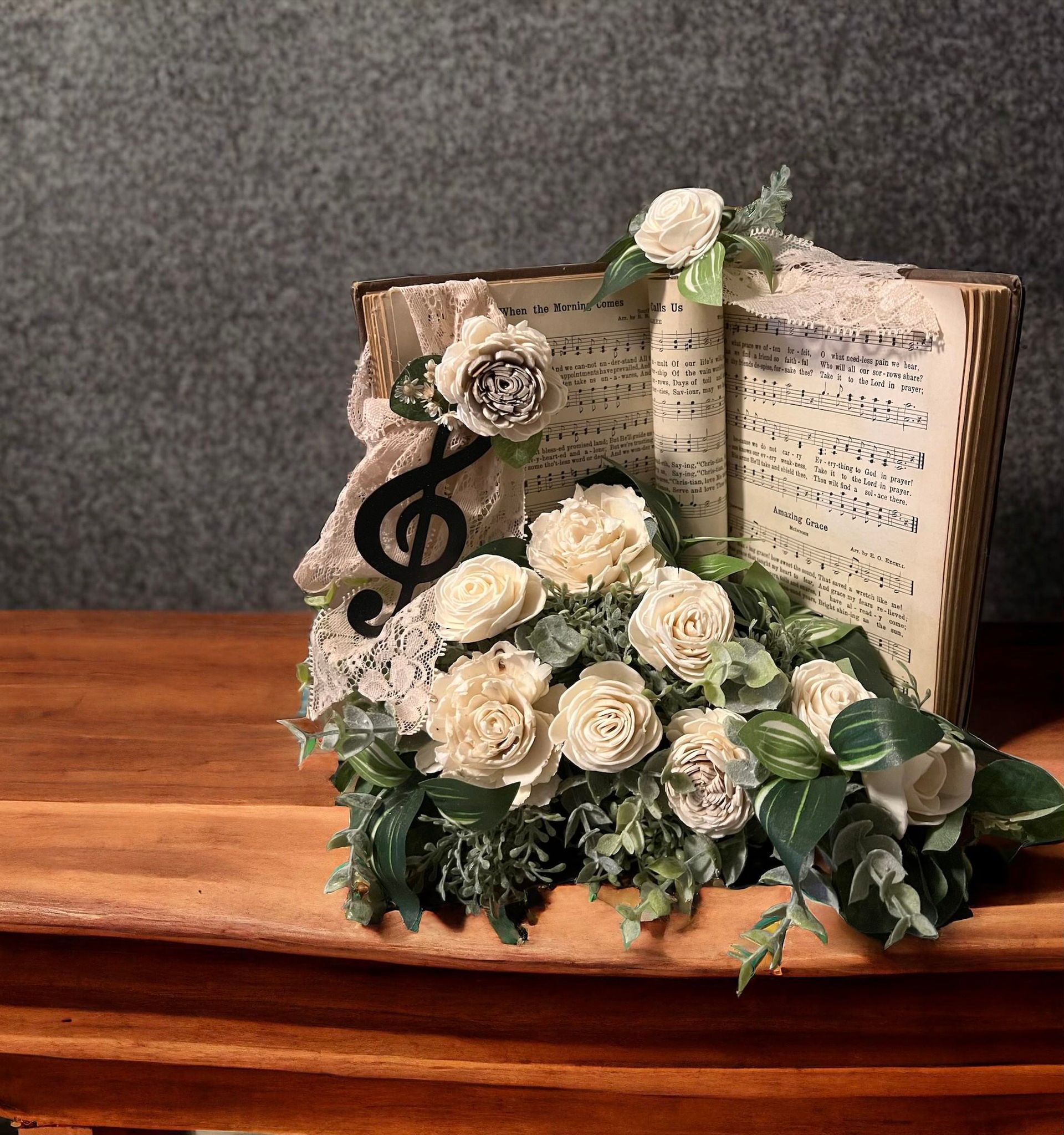 hymnal with white wooden flowers