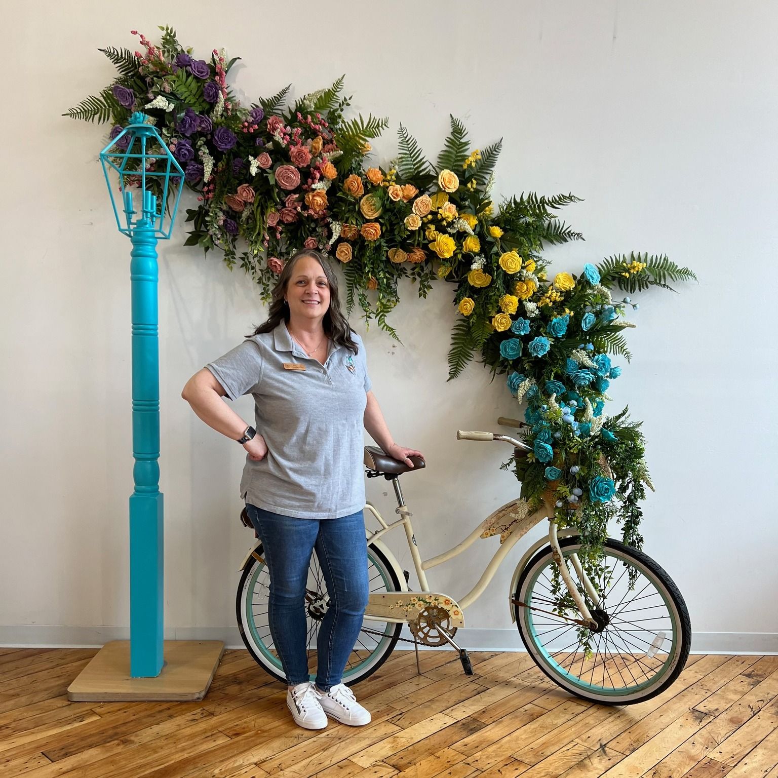 cascading rainbow wooden rose arrangement