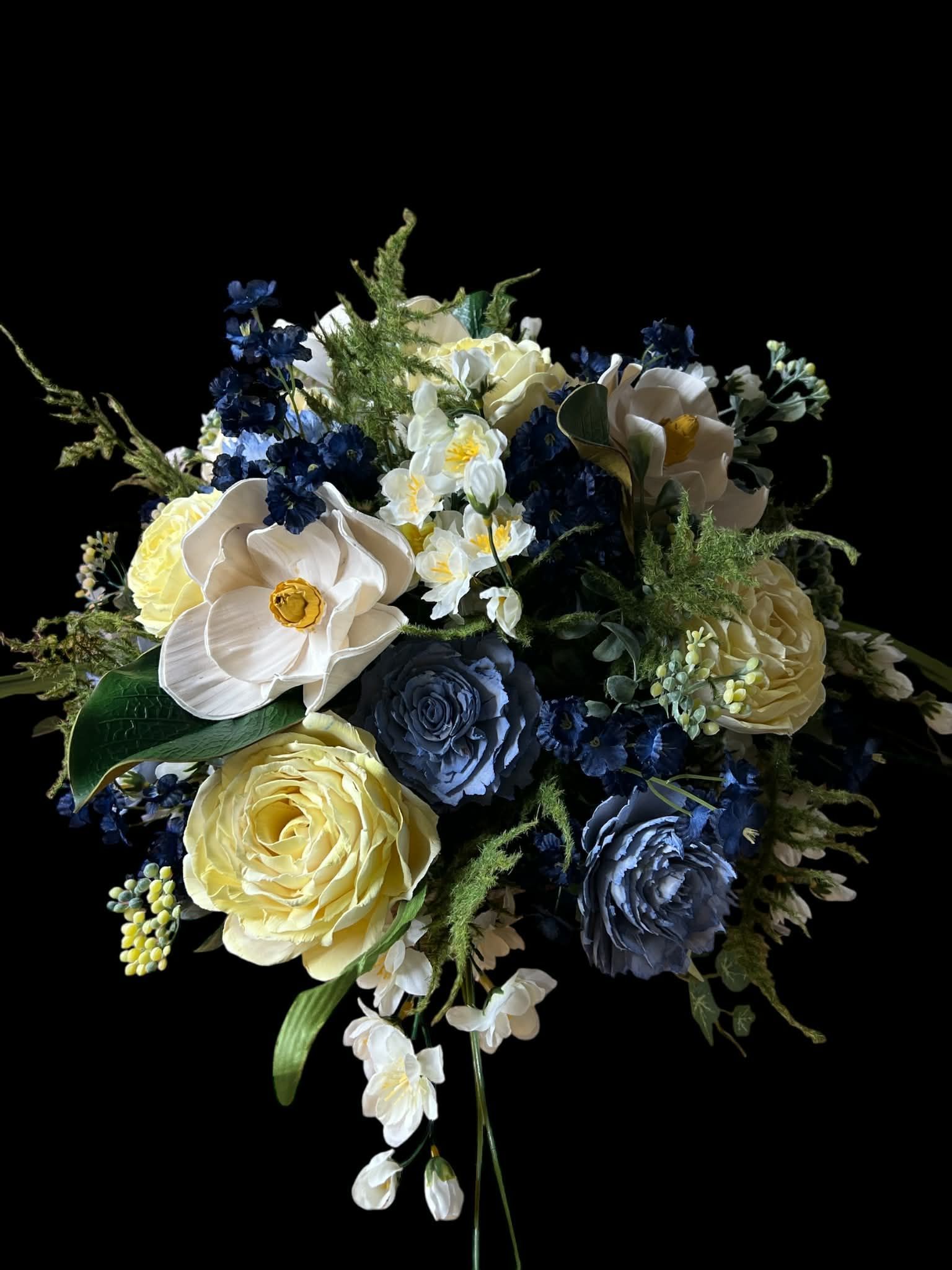 blue and yellow wooden flower arrangement
