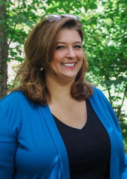 Megan Hoskins's professional headshot.