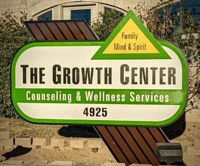 Sign outside The Growth Center location in New Albany, IN.