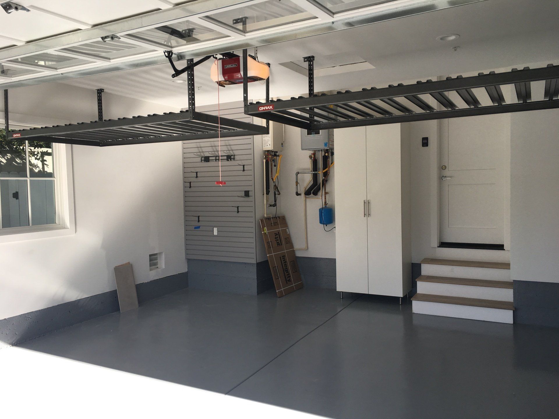 a garage slatwall system with garage overhead storage
