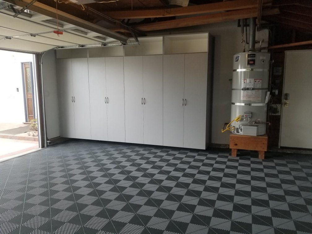 a garage cabinets with Swisstrax flooring