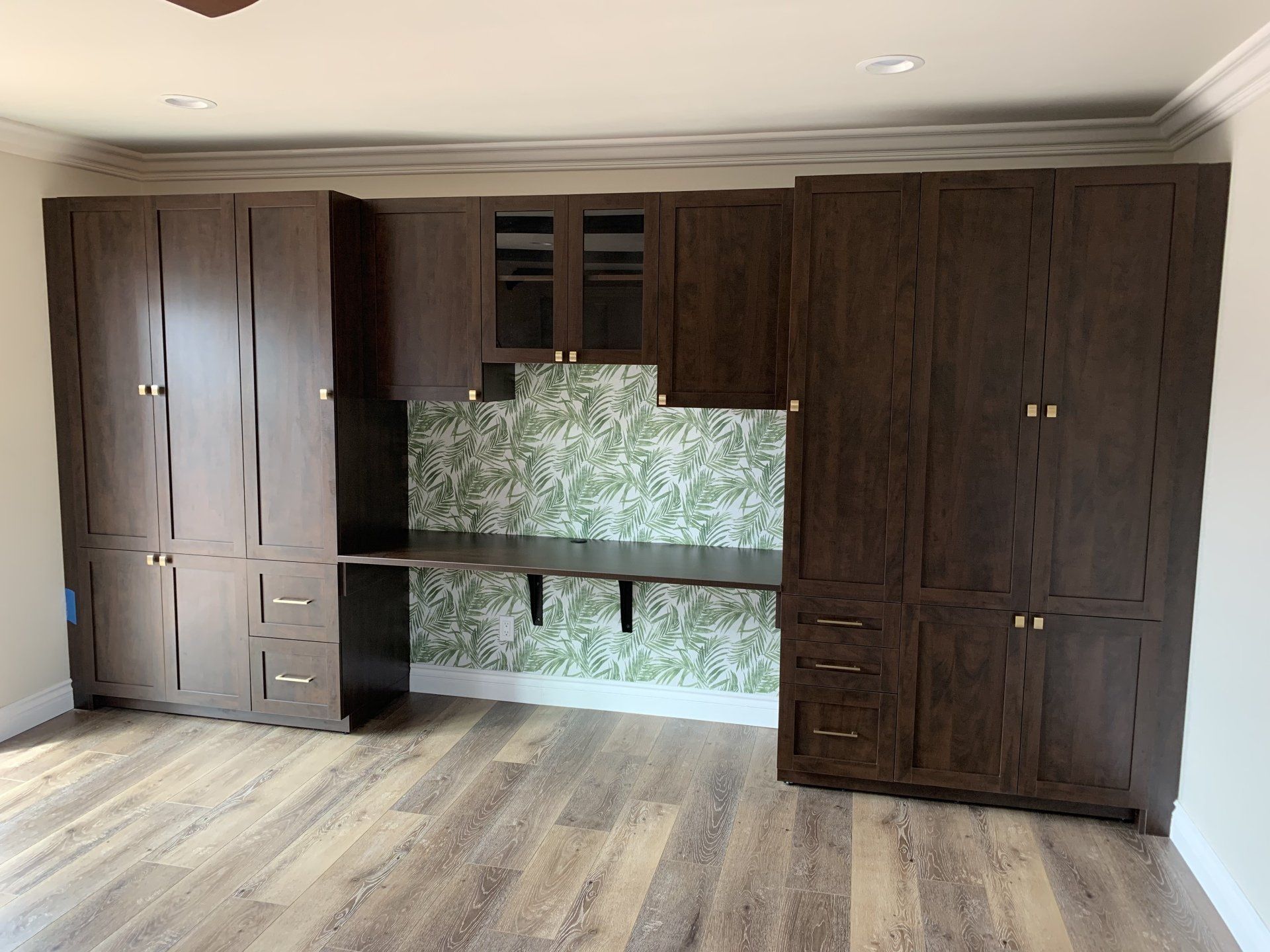 a chocolate pear closet Armoire System with Countertop