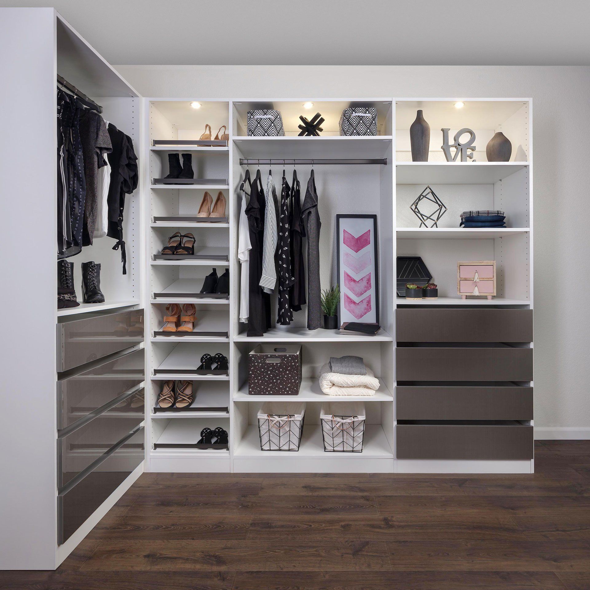 a closet armoire system with drawers and shelving