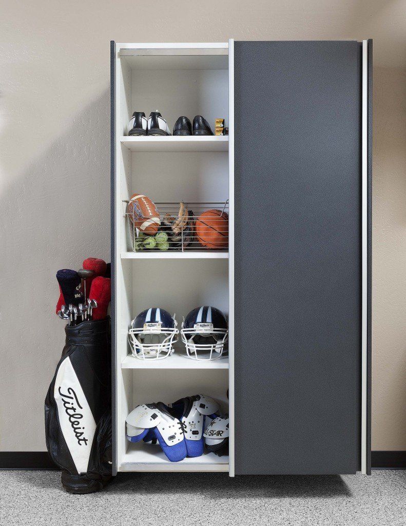 a granite storage cabinet with sports equipment inside