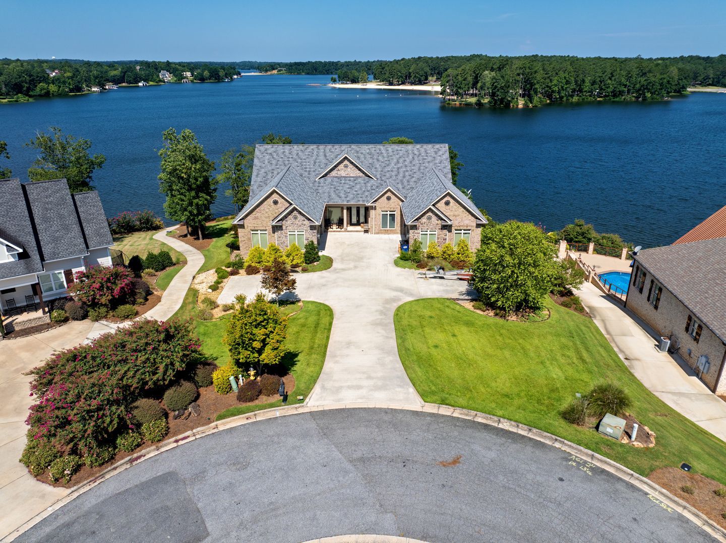 a home in Macon whose lawn has been treated, resulting in thicker, healthier grass