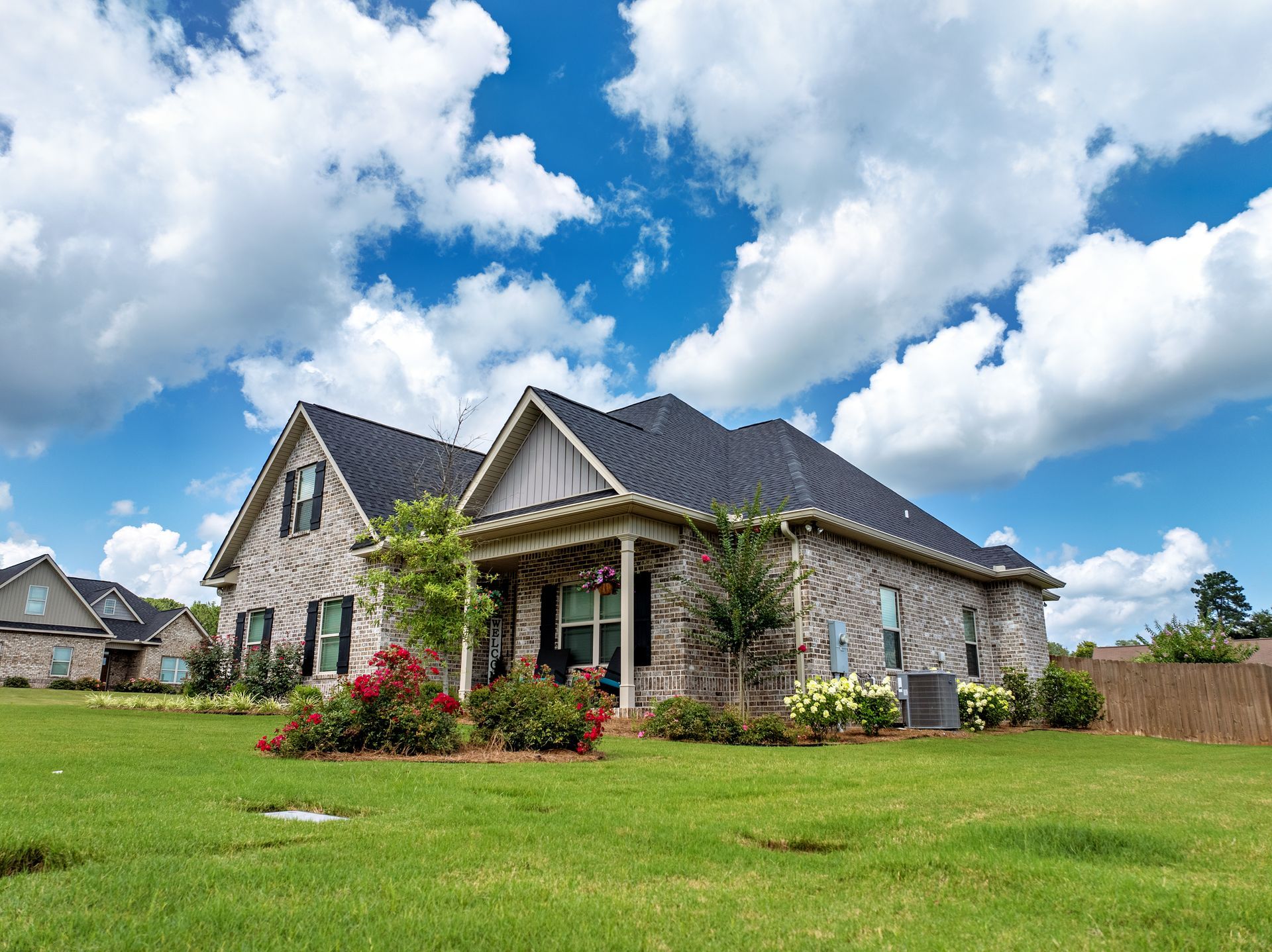 a home in Forsyth whose lawn has been treated, resulting in thicker healthier grass