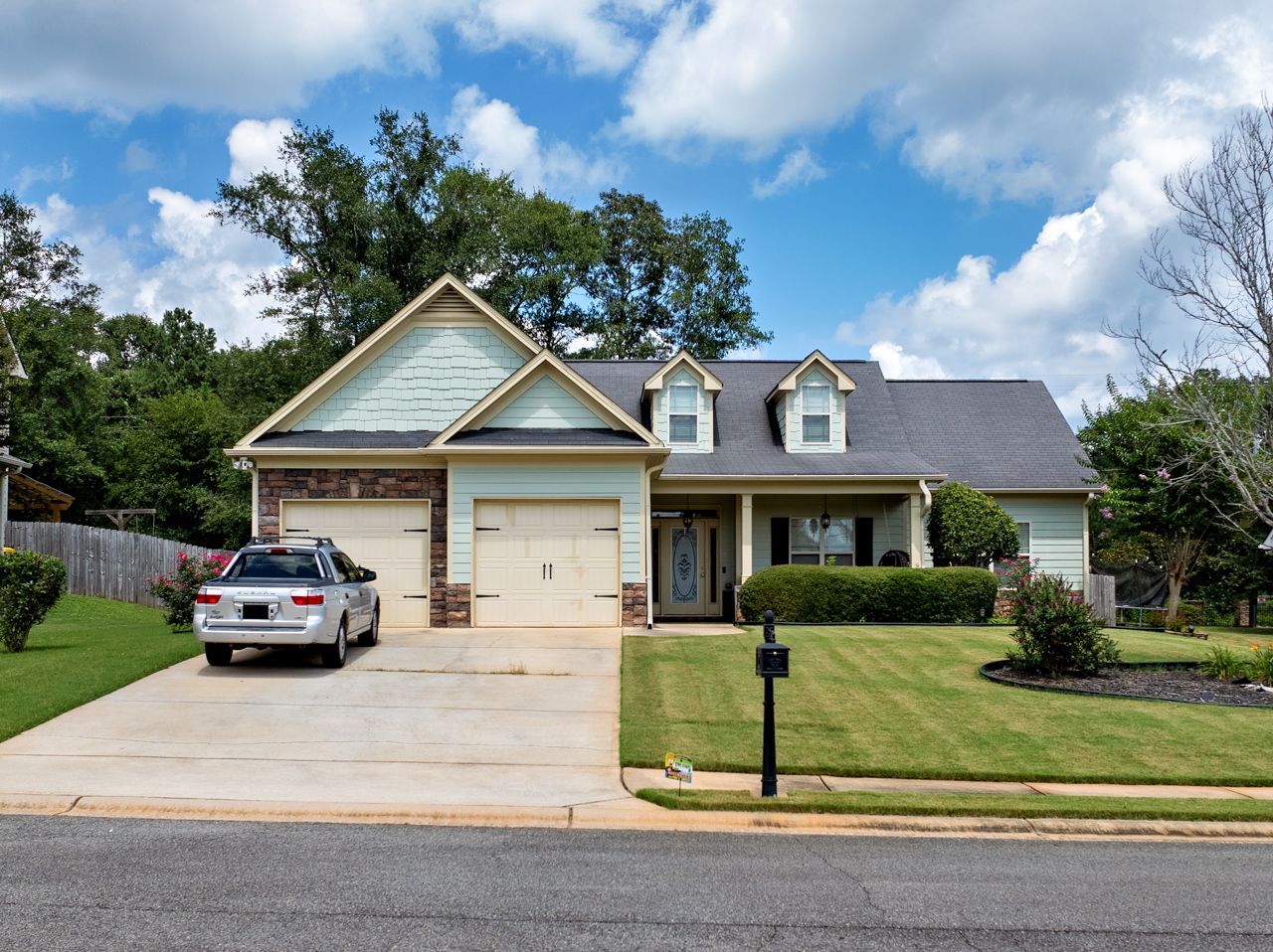 Weed-free backyard serviced by Turf Magic in Georgia.