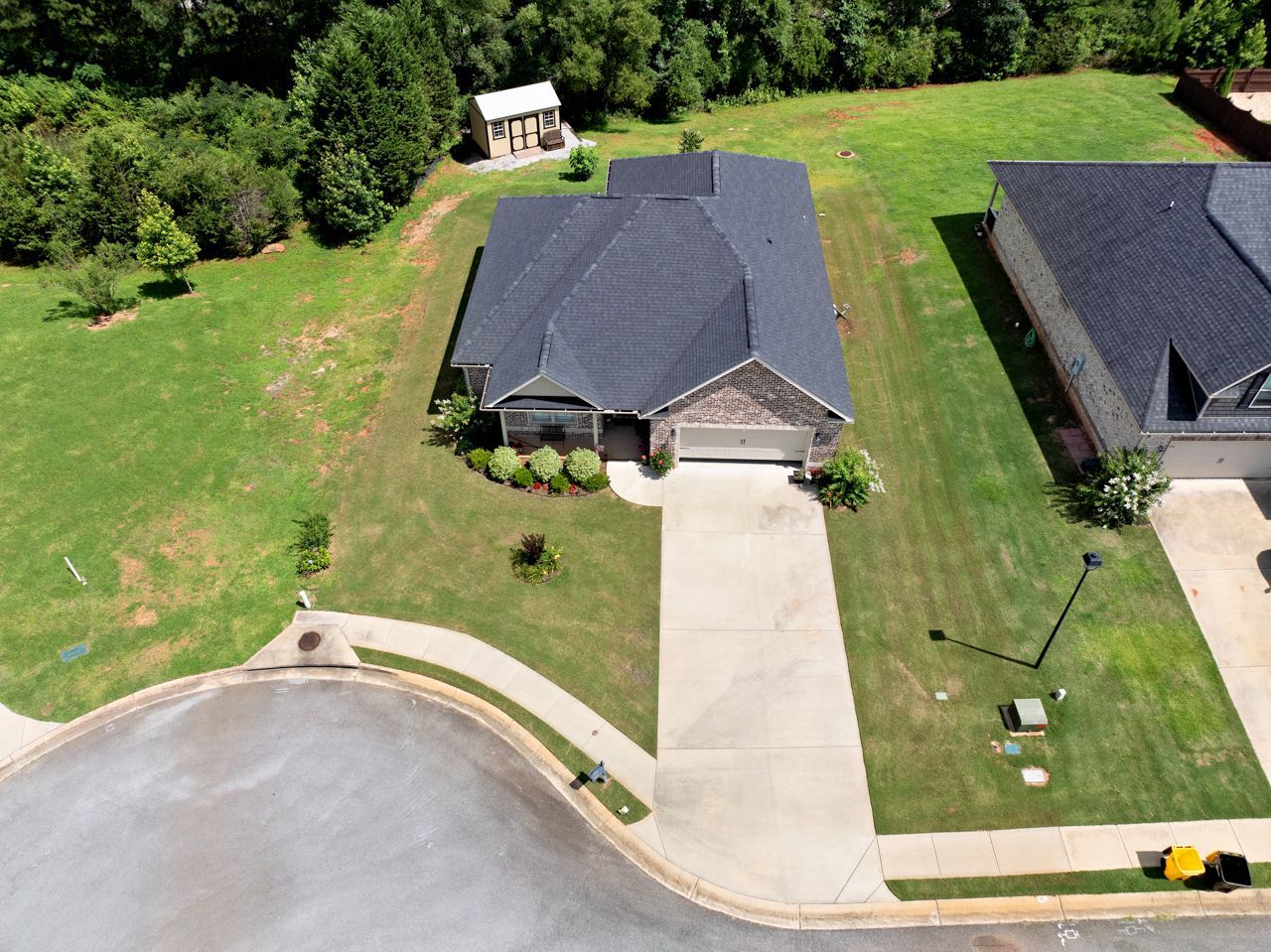 Residential lawn flourishing from Turf Magic services in Forsyth