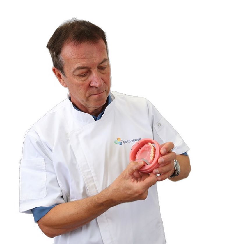 Dentist Examining Denture Model — My Denture Clinic in Inverell, NSW