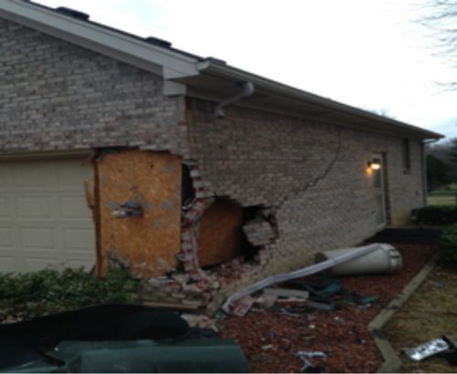 A house with a hole in the side of it