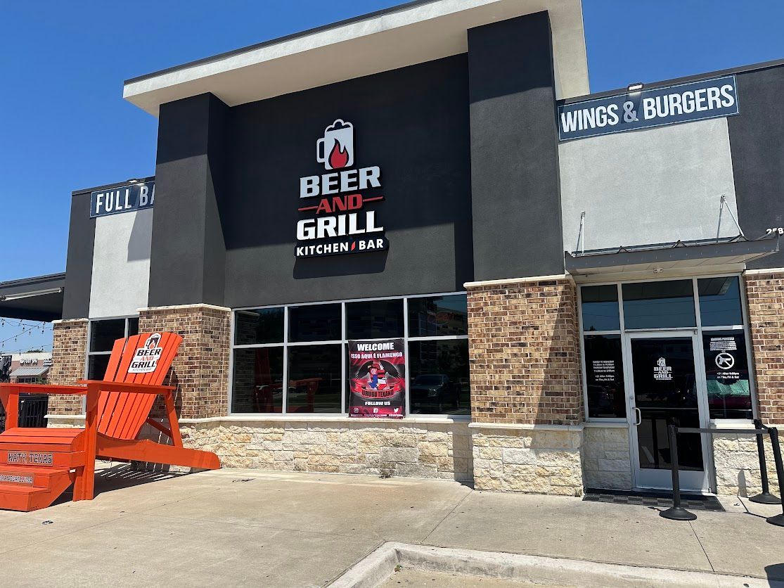 The outside of a restaurant called beer and grill