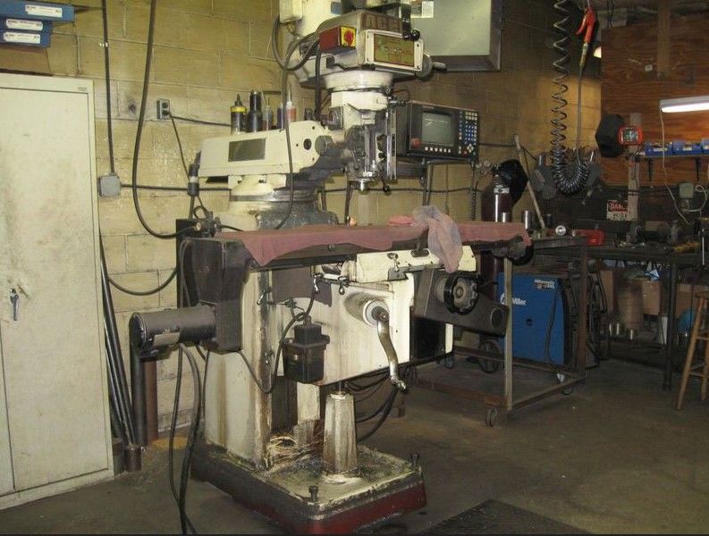 A machine is sitting in the middle of a room