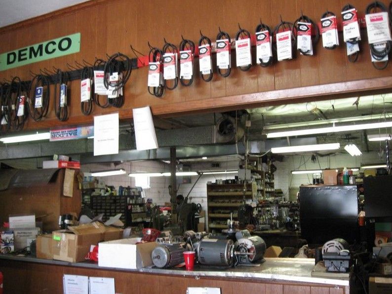 A store with a sign that says demco on it