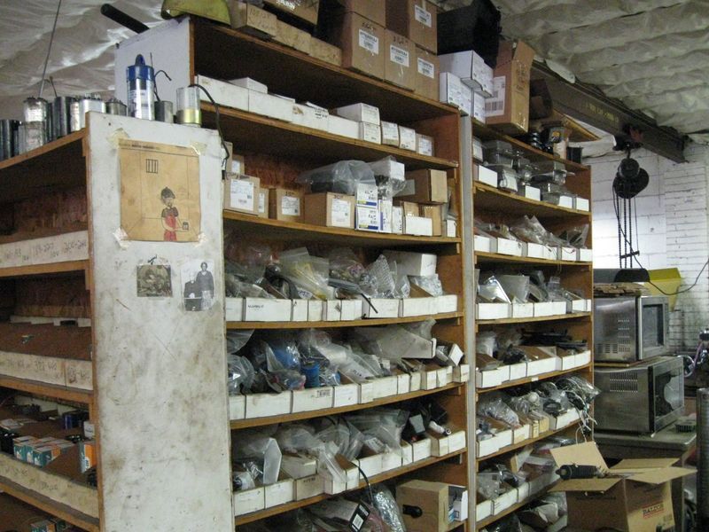 A warehouse filled with lots of boxes and shelves