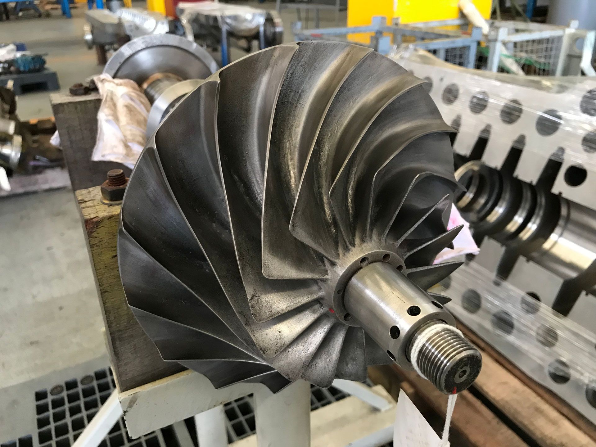 A close up of a metal object with a tag attached to it