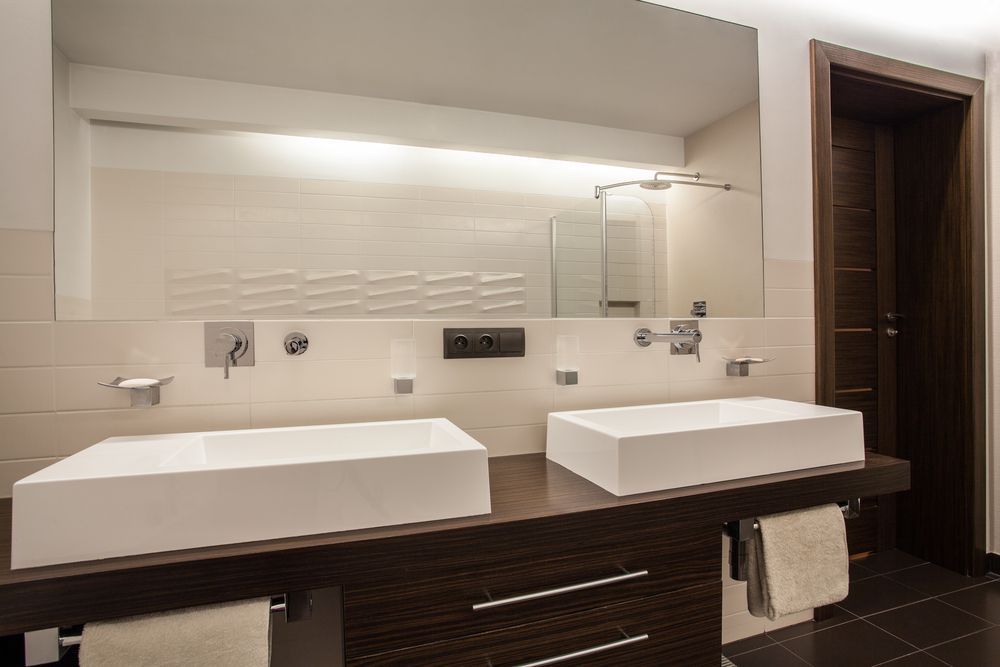 A Bathroom With Two Sinks and a Large Mirror — Hunter Kitchen King In Port Stephens, NSW