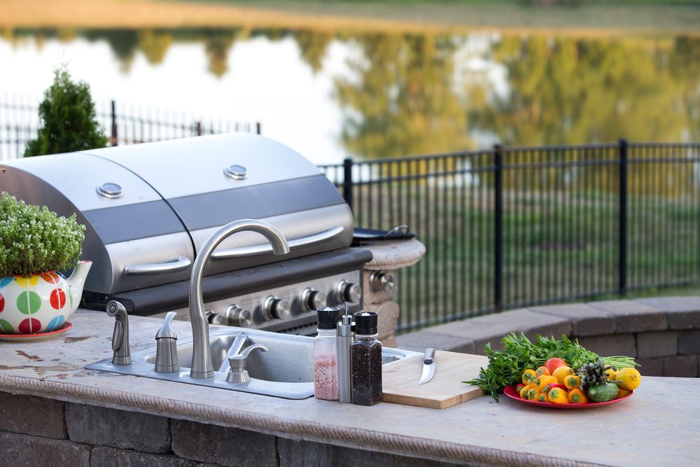A Grill is Sitting on Top of a Counter Next to a Sink — Hunter Kitchen King In Port Stephens, NSW