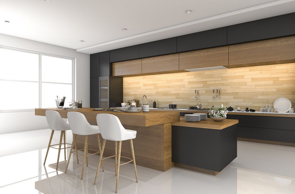 A Modern Kitchen With a Large Island and Stools — Hunter Kitchen King In Edgeworth, NSW