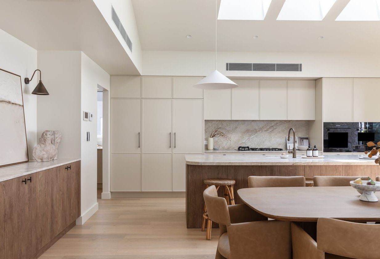 A Side view of a kitchen island with three stools — Hunter Kitchen King In Rutherford, NSW