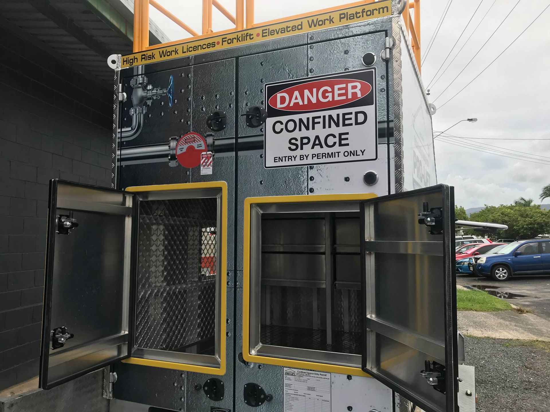Confined space container with open doors and a danger sign — Boyd's Fabrications In Portsmith, QLD