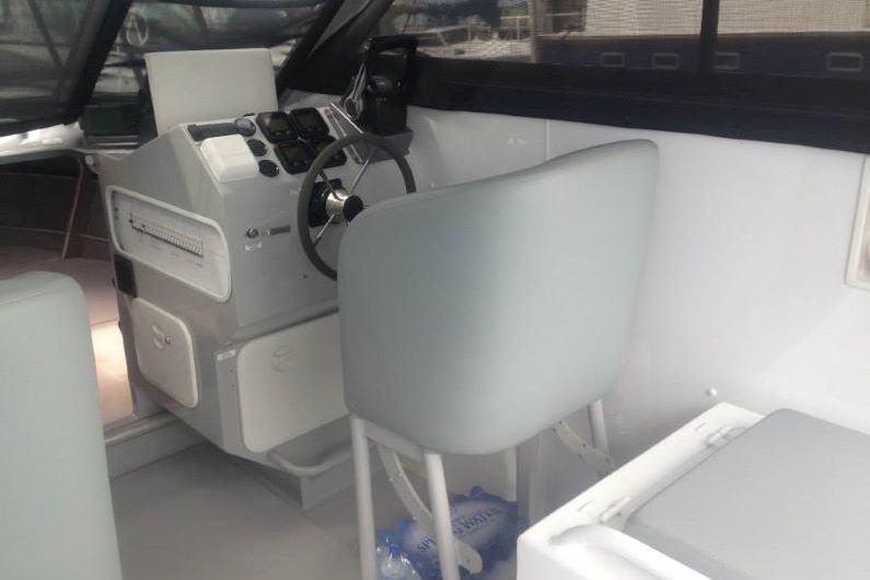 The Inside of a Boat With a Steering Wheel and a Chair — Boyd's Fabrications In Gordonvale, QLD