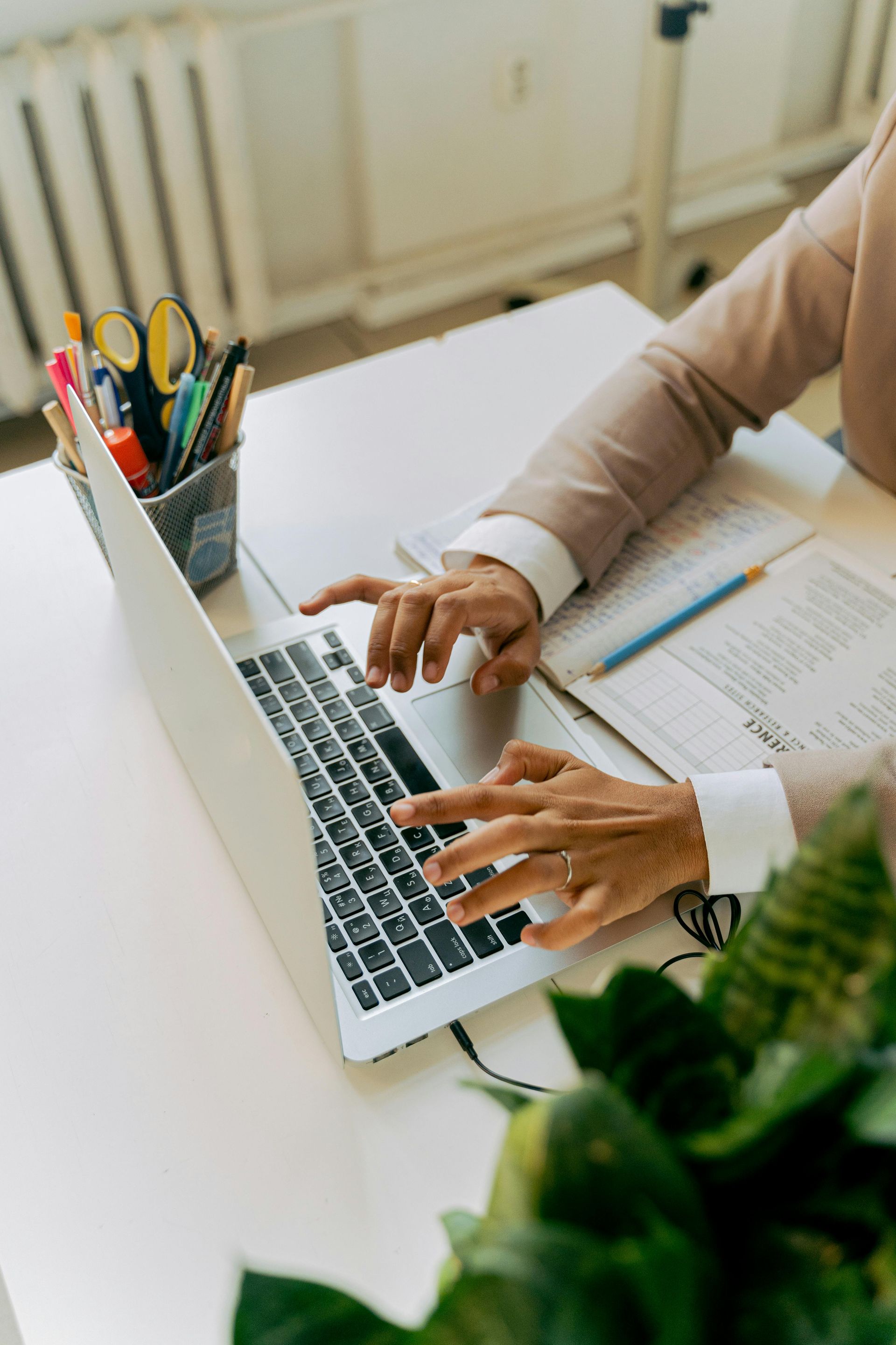 person typing on computer