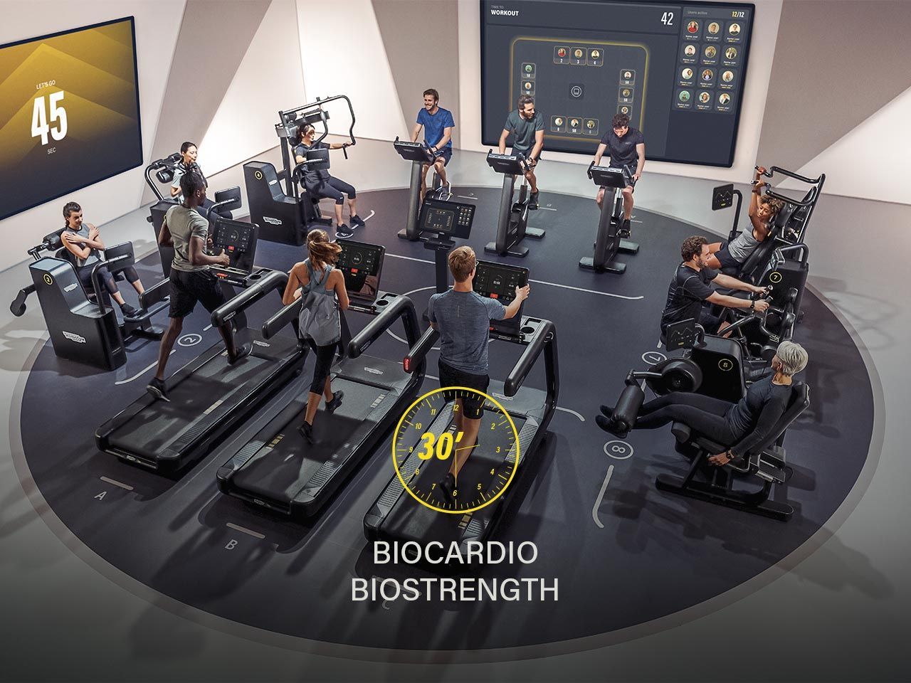 Mensen trainen op verschillende apparaten in een ronde studio. Digitale timers, 