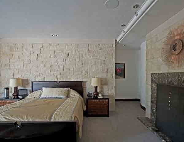 Master Bedroom with Brick Wall — Interior Plastering in Oklahoma City, OK