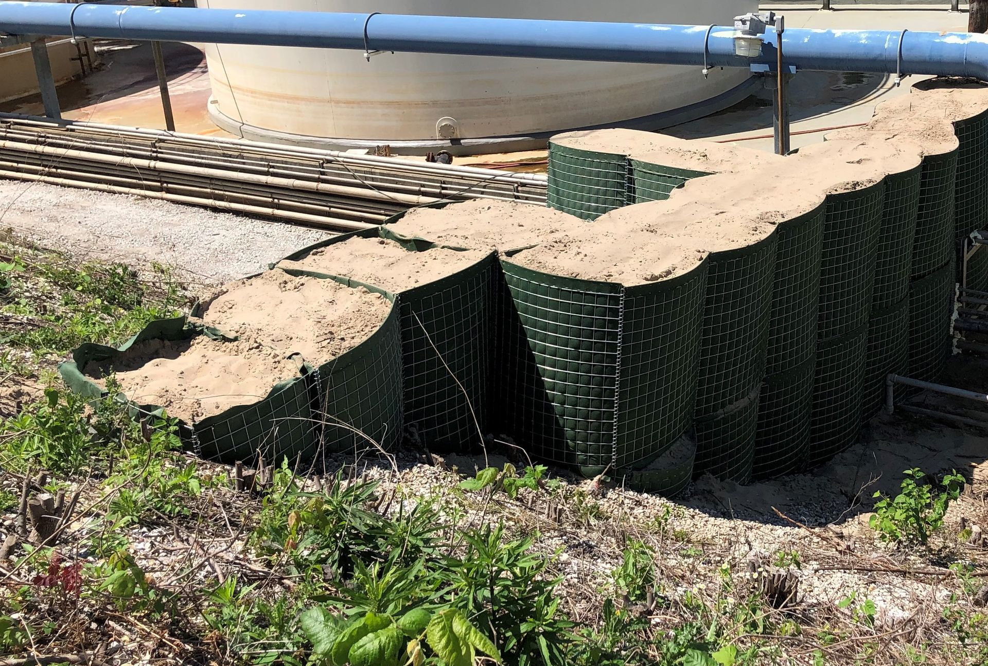 HESCO Barriers tied into a levee for flood defense operations
