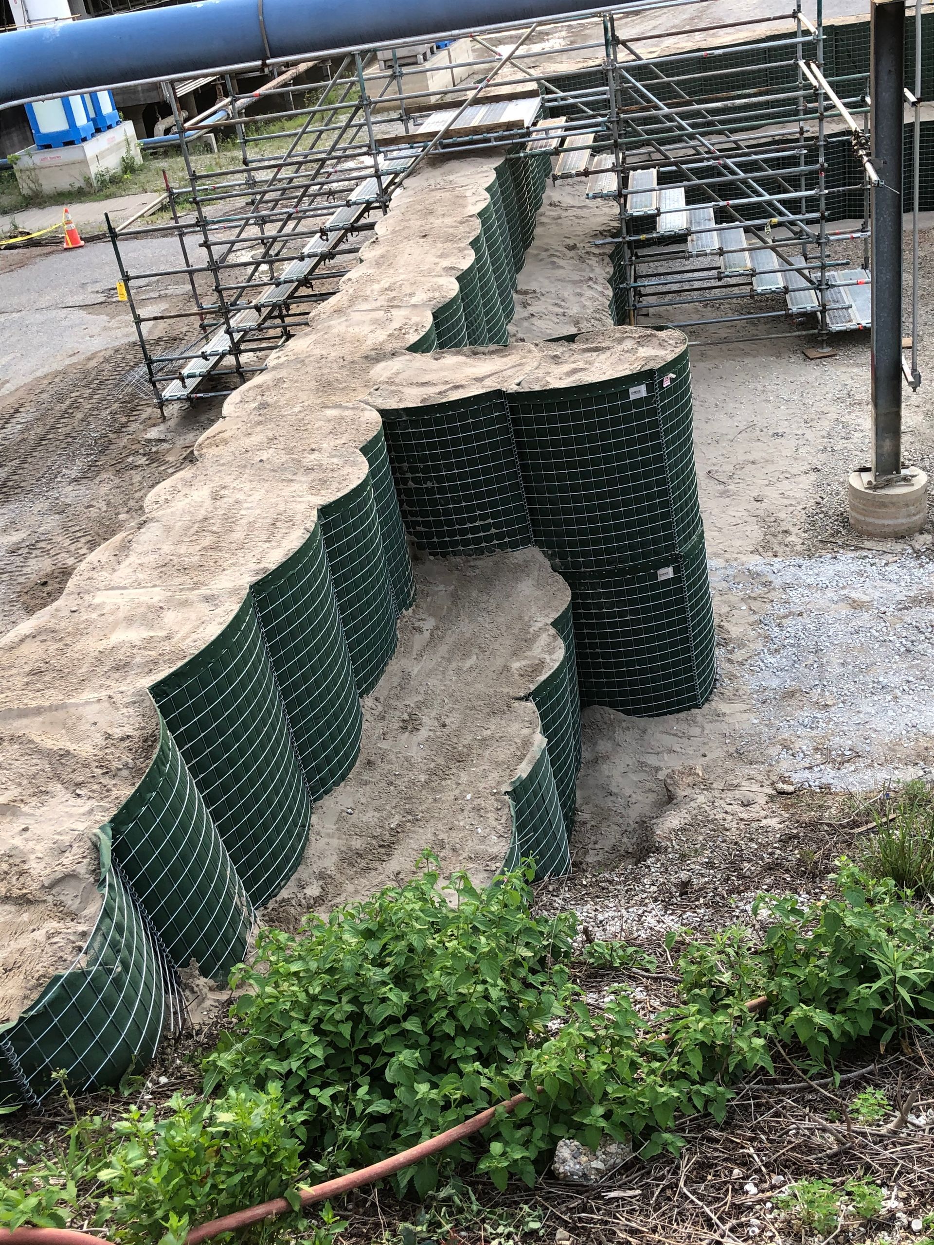 HESCO Barrier with buttress cells installed for additional stability of a flood wall