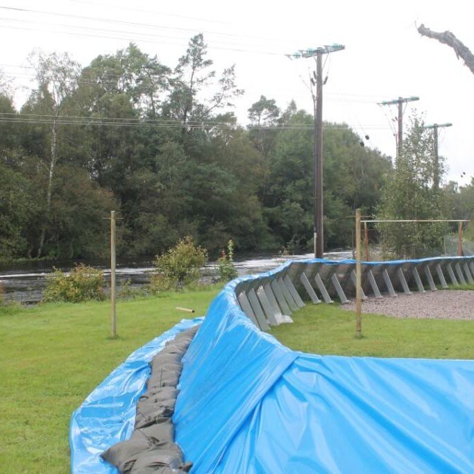 Flood Barrier Deployed With Liner