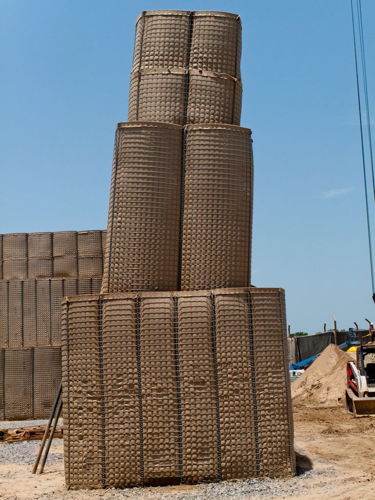 Example of a leaning HESCO Barrier as a result of poor compaction during construction