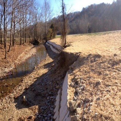 Stream bank stabilization and erosion control with the RIBS flood barriers