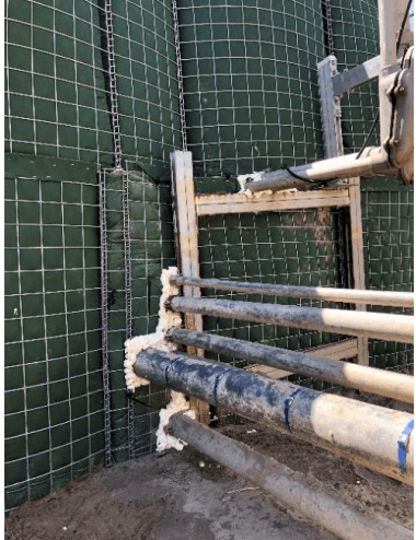 HESCO Flood Barrier can be modified to allow pipes to pass through them. We call it 'plumbing through the wall'. HESCO is great because it is easy to modify around complicated situations.