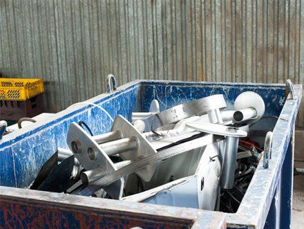 bin with metal scraps inside