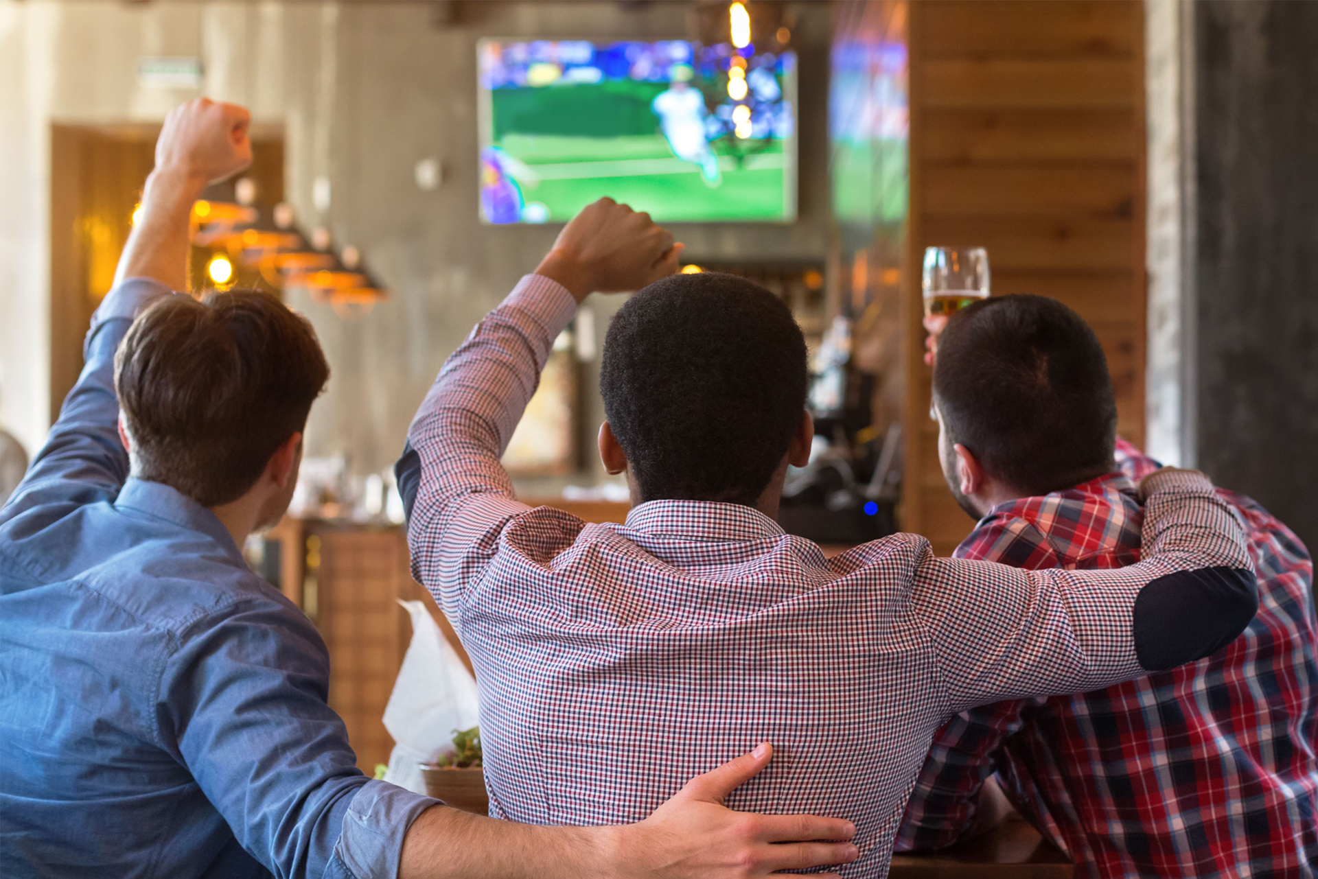 Mates watching the match in a pub