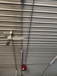before and after metal ceiling power washing
